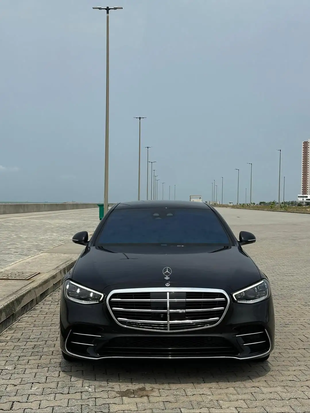 Black Mercedes-Benz S580 chauffeur car for studio clients in Lagos