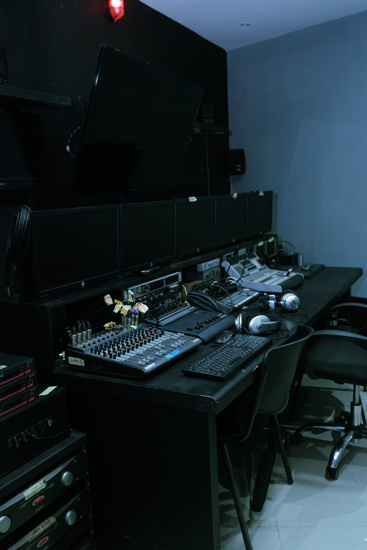 Music production and 5.1 surround post studio with console and monitors