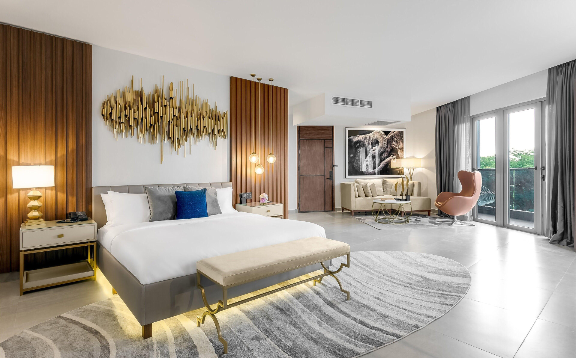 Premium hotel suite bedroom prepared for visiting Digitrack Studios clients in Lagos